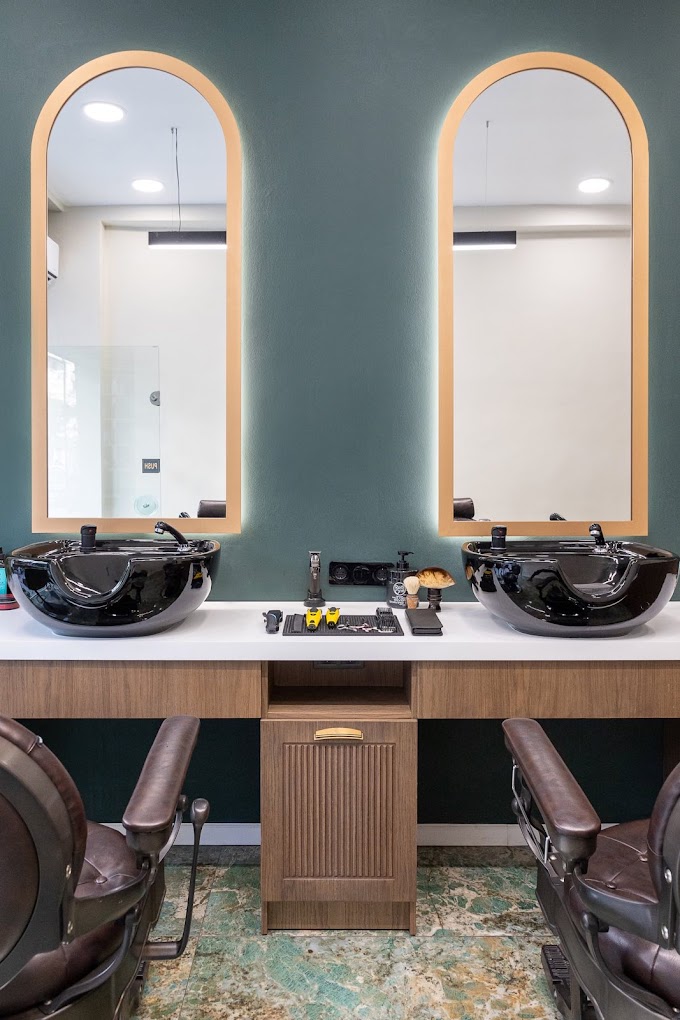 Barbershop interior with sinks and chairs